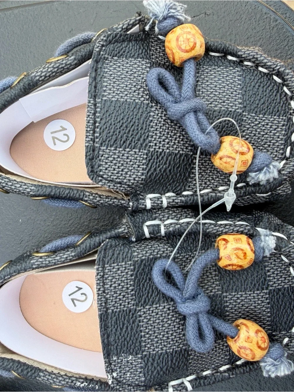 Kids Black Check Moccasin Slip-Ons with Decorative Bead Ties